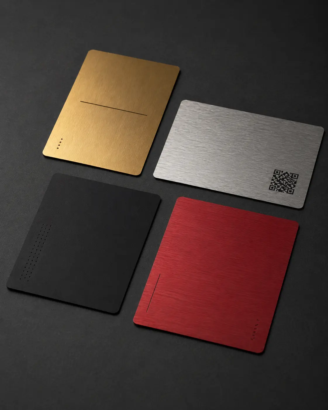 Thin cards in brushed gold, silver, black and red metal finishes