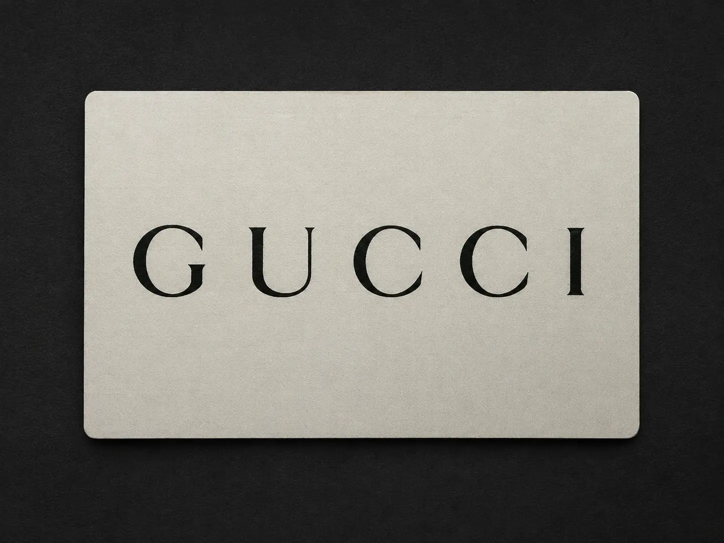 Front of an ivory-finished bamboo Gucci connected product card