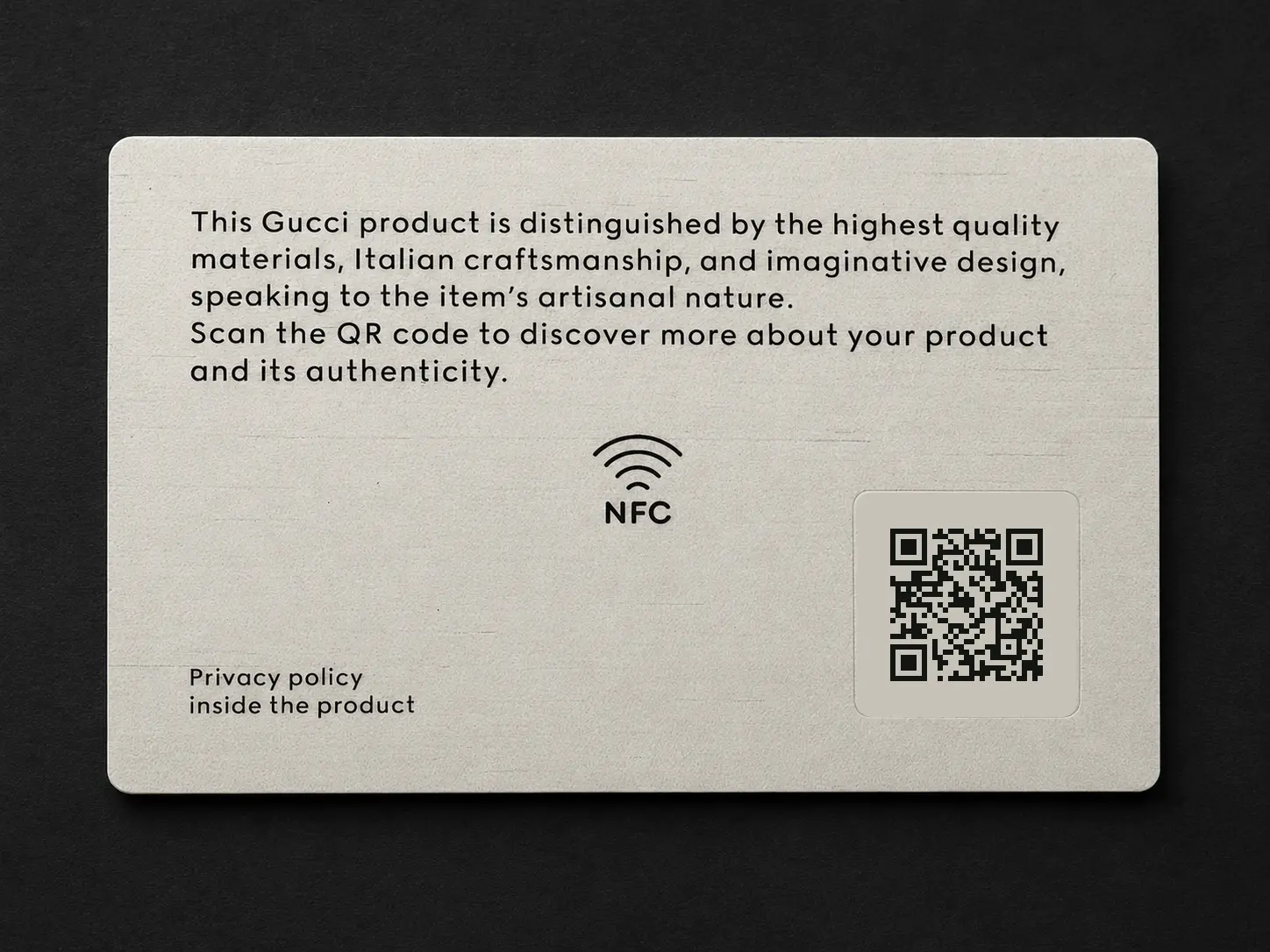 Reverse of an ivory bamboo Gucci connected card with NFC instruction and QR code