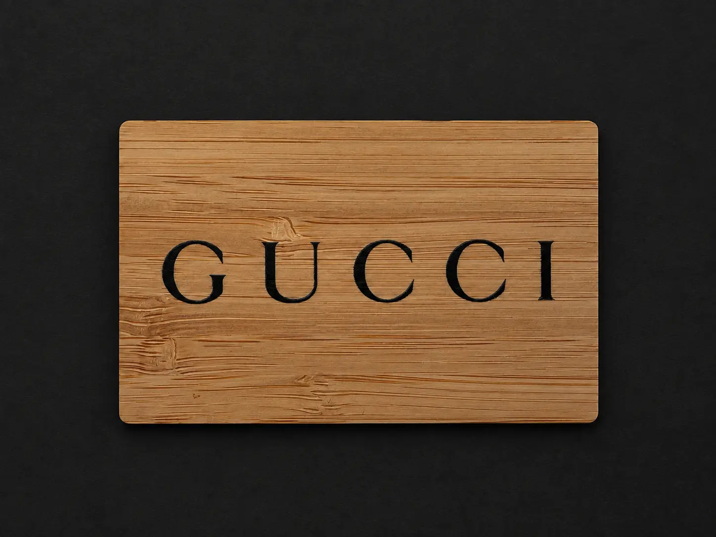 Front of a natural bamboo Gucci connected product card