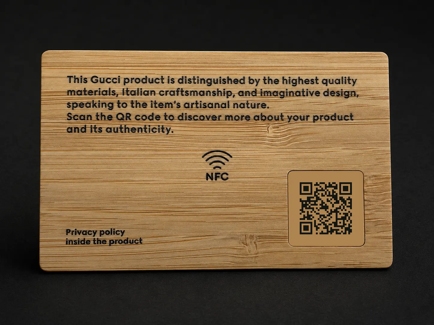 Reverse of a natural bamboo Gucci connected card with NFC instruction and QR code